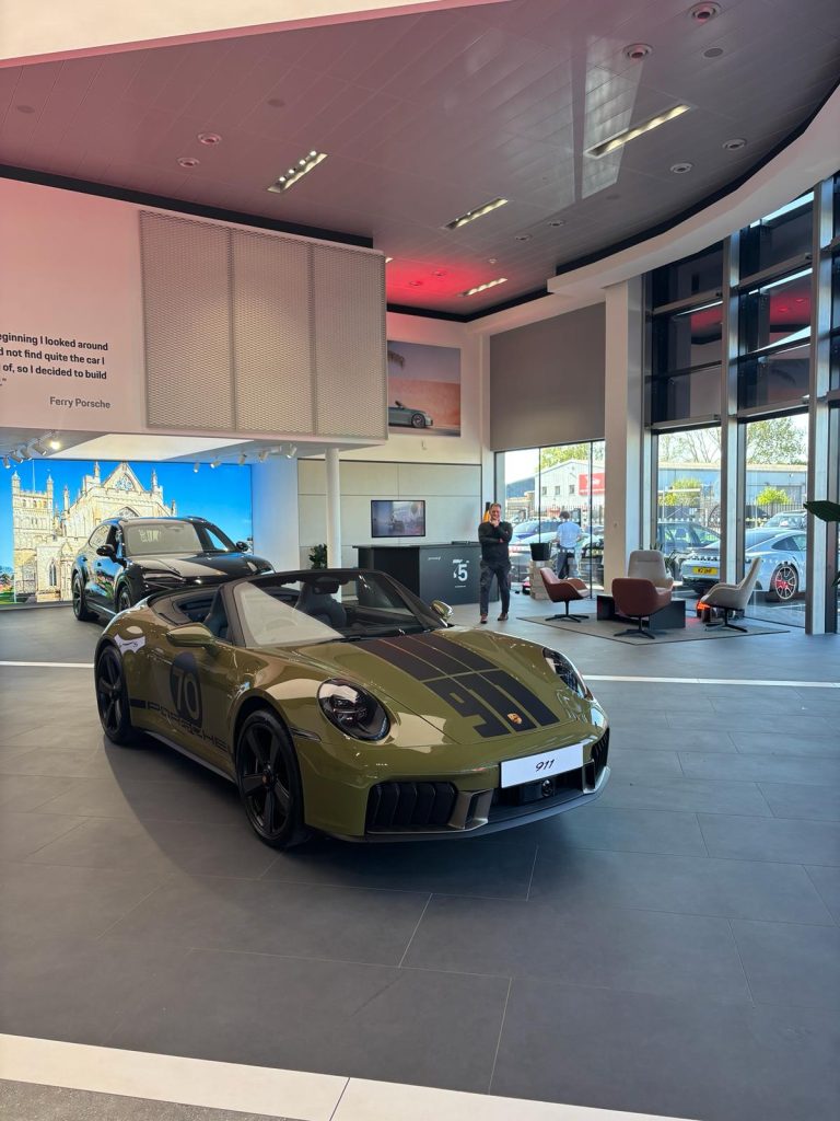 Porsche 911 showroom floor cleaned by Signature Cleans commercial cleaning, Exeter